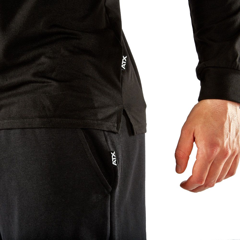 Langermet treningsskjorte svart 100 % bomull str. S-XL montert på modell