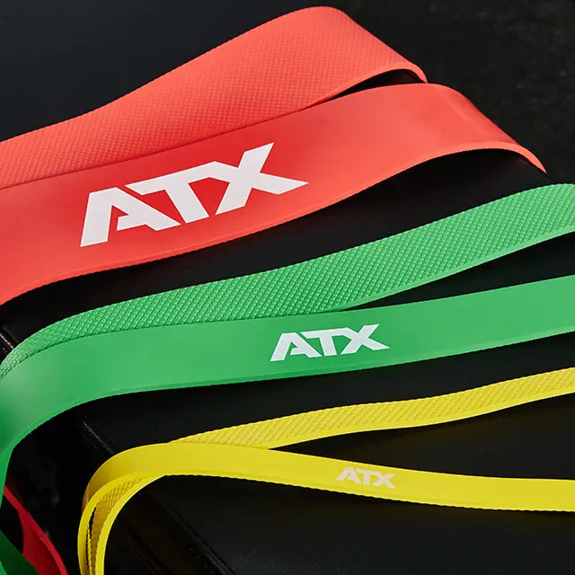 Resistance band Level 4 lateksfri oransje opptil 33 kg montert