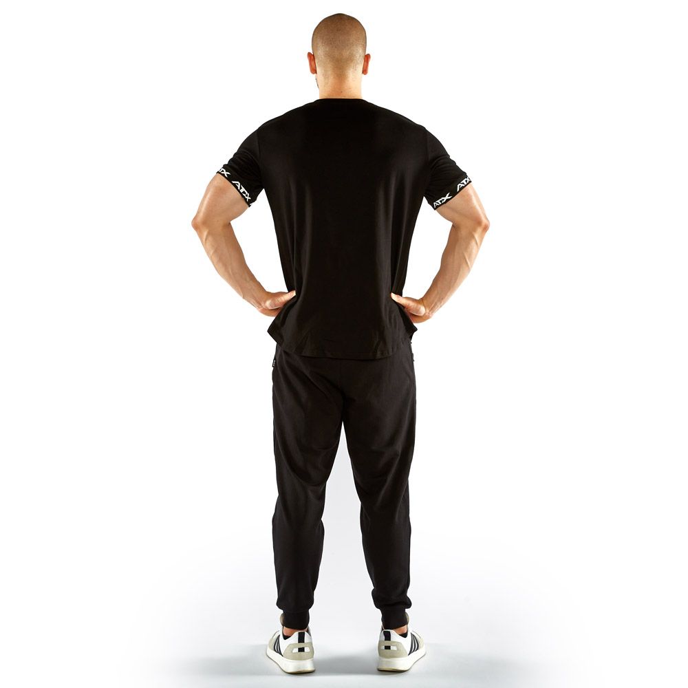 Trenings-t-skjorte 100 % bomull svart S–XL logo detalj